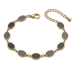 Elegant Oval Charm Bracelet – Black & Gold Style