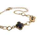 Luxury Gold Clover Charm Bracelet – Black Elegant Design