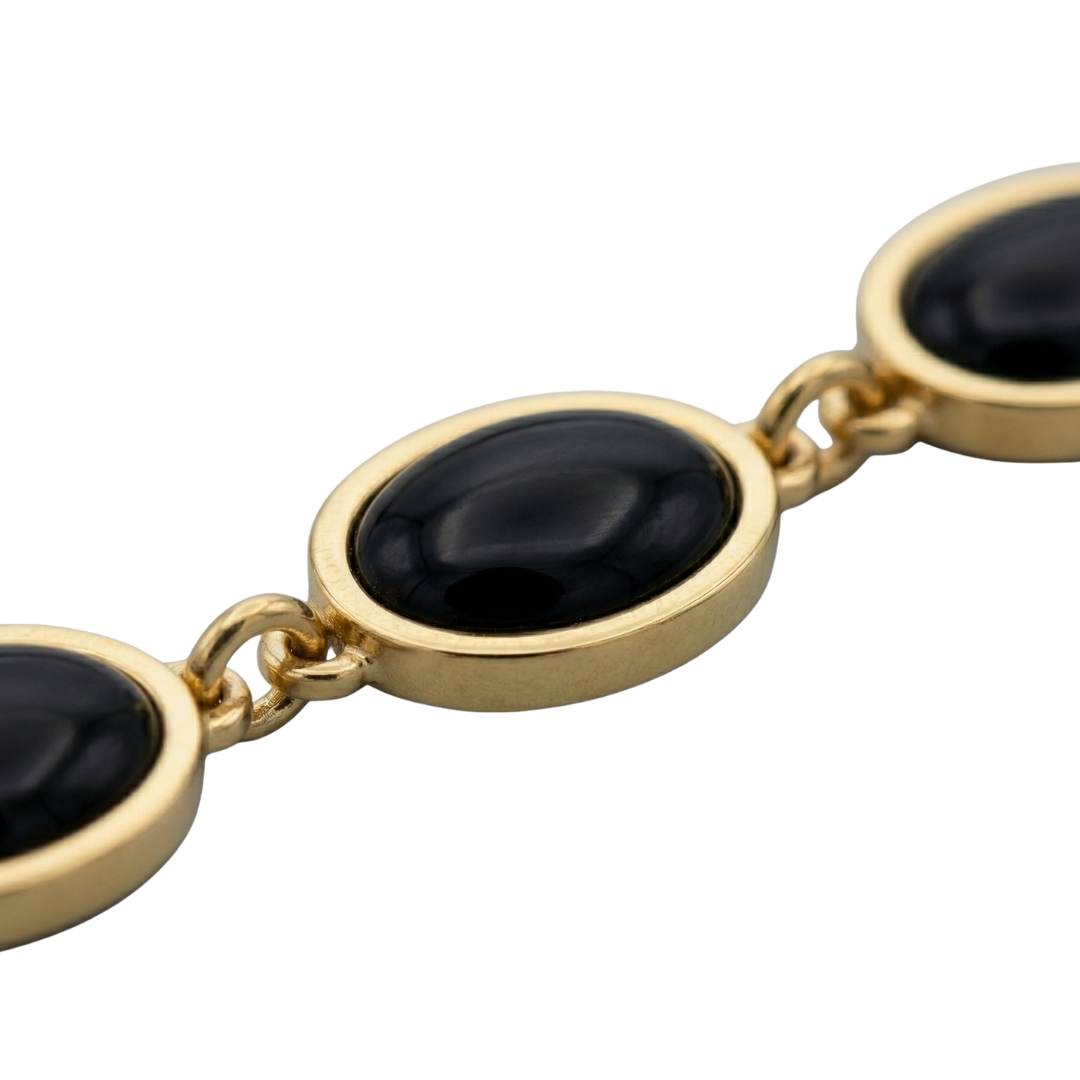 Elegant Oval Charm Bracelet – Black & Gold Style